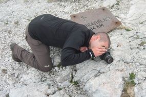 Photographer finding the angle on the mountain in Bratislava, Slovakia