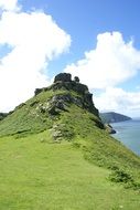 Green grass on a cliff