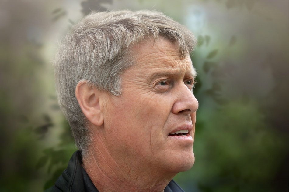 portrait of a surprised man in the forest