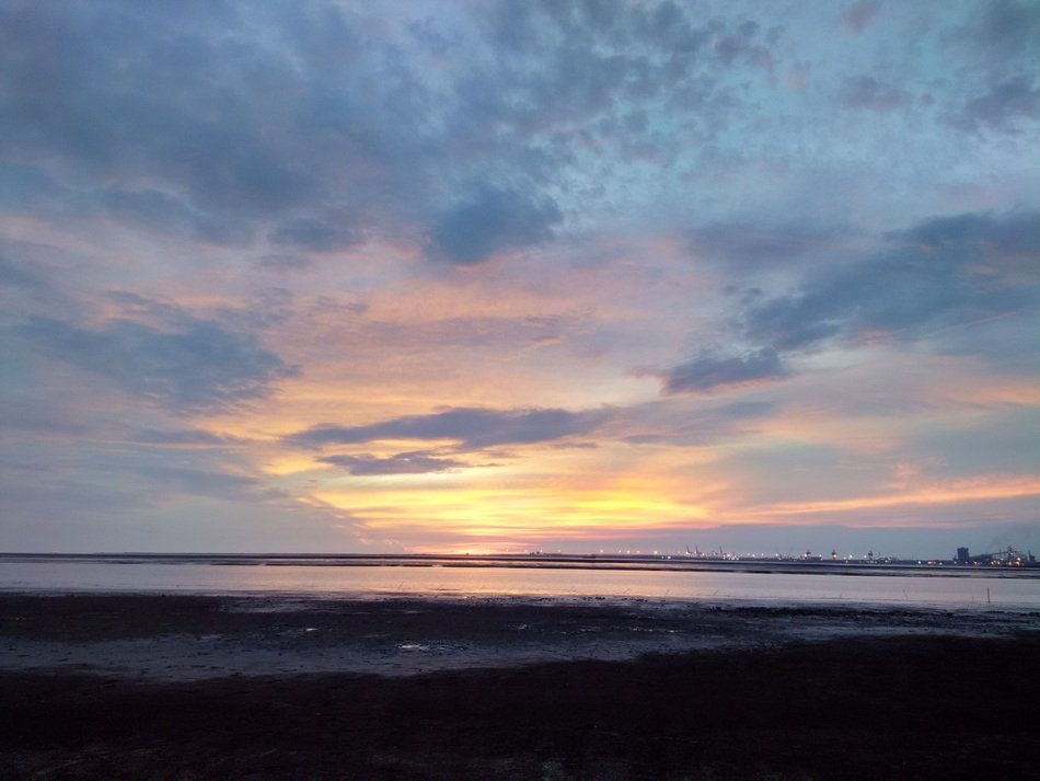 bright horizon against the background of the cloudy sky