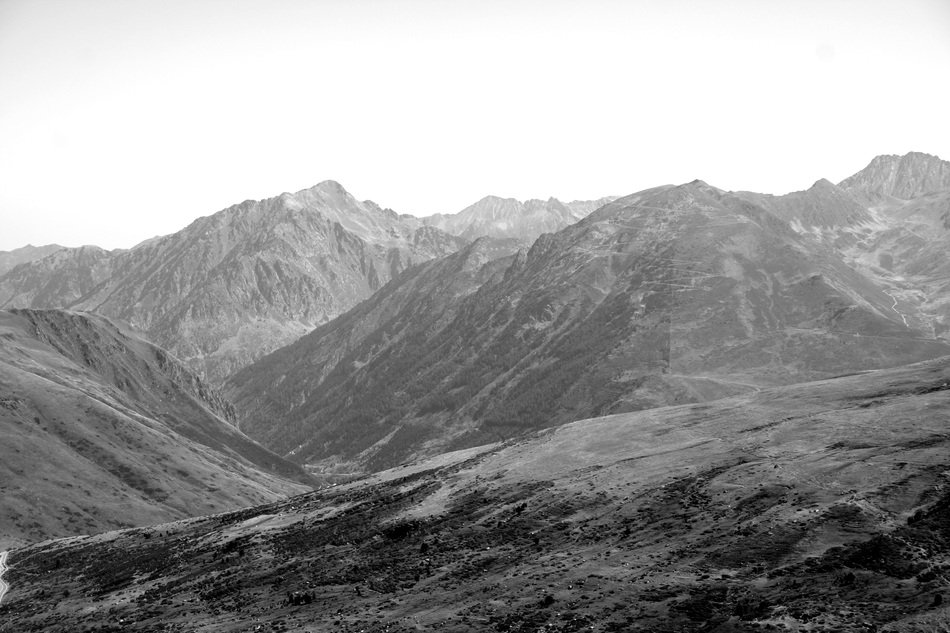 black-and-white image of the countryside in the Alps