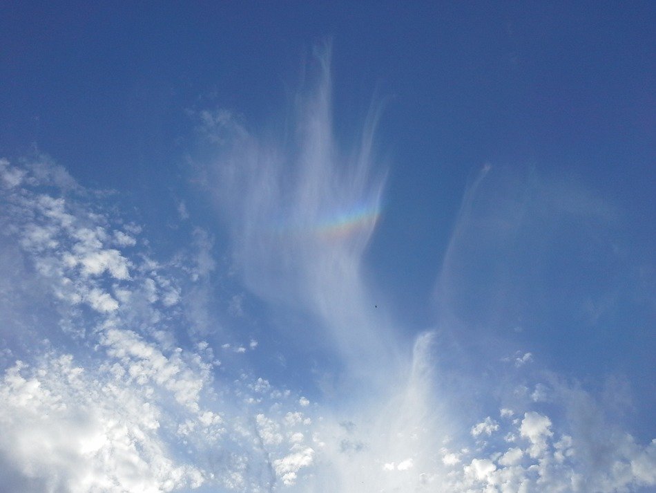 cloud streaks on the blue sky