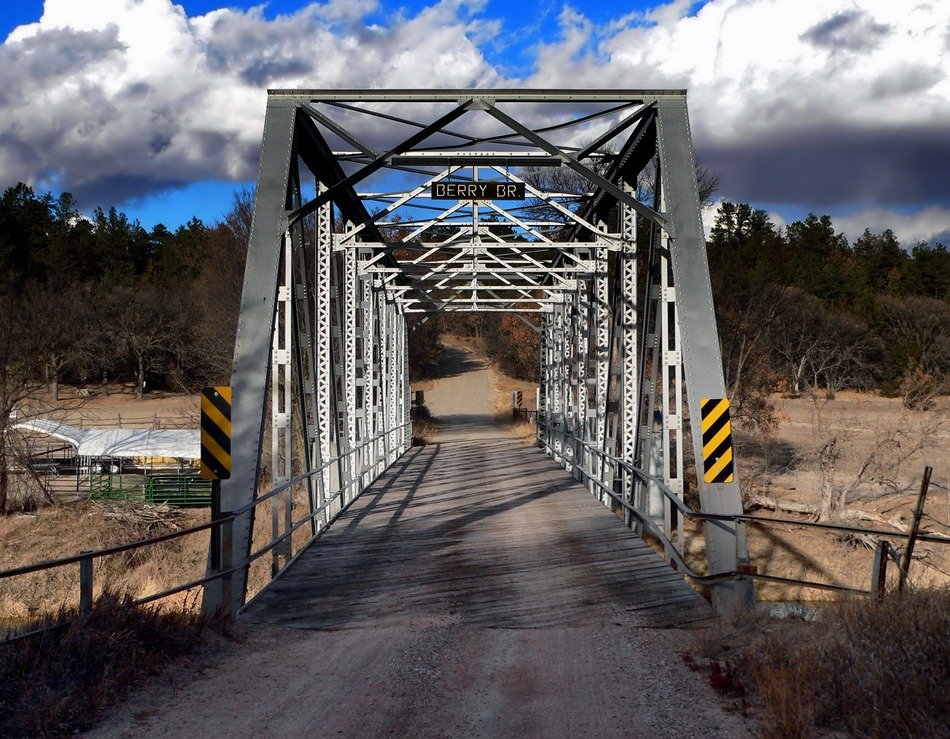 road through berry bridge at fall, usa, nebraska