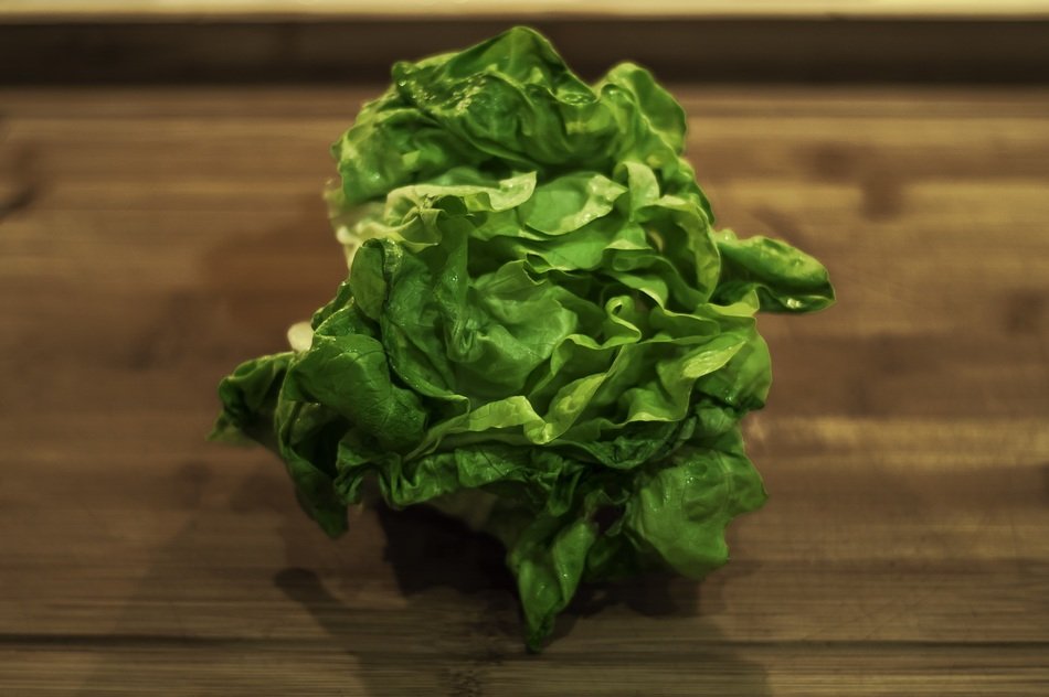 green lettuce on the cutting board