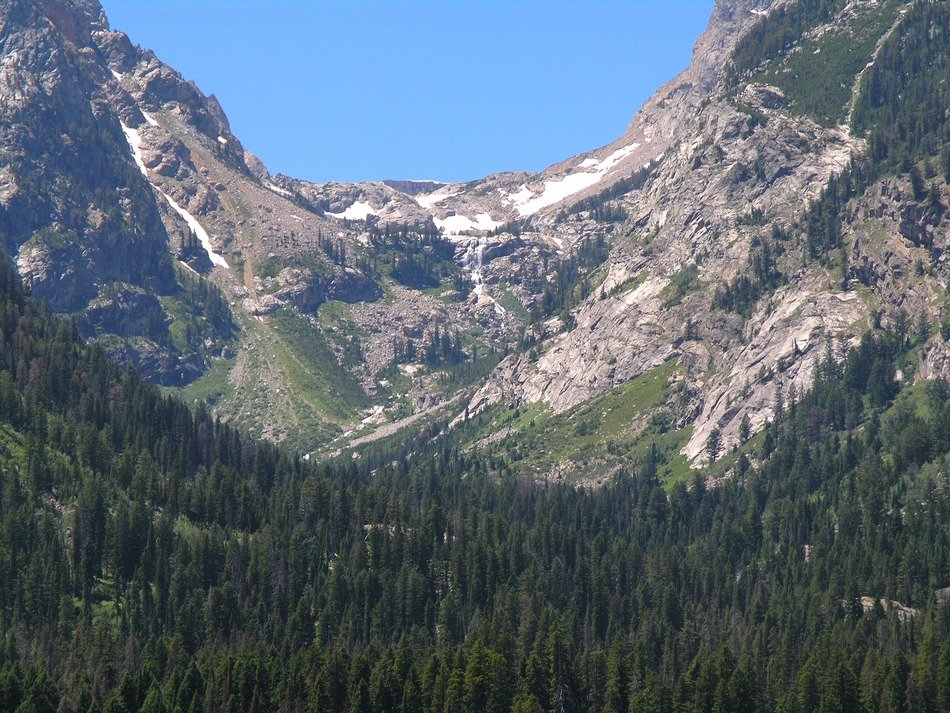 ravine on a background of snow-capped mountains, usa, wyoming, Grand Teton National Park