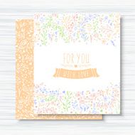 Vintage cards with flower patterns and ornaments wooden background