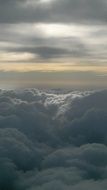 white fluffy clouds view from the plane
