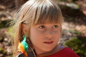 outdoor portrait of a blond girl