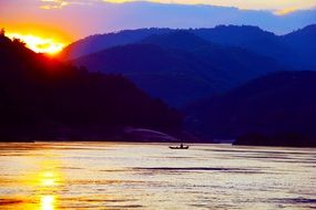 bright yellow sunset over a picturesque landscape