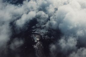 above the clouds from a bird's flight