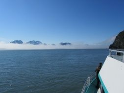 boat in the sea on a background of mountains