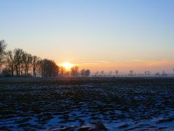 wintry sunset back light