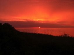red sky over the ocean