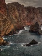 rocky coast of Ponta de Sao Lourenco in storm