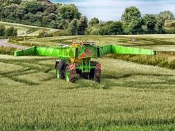 landscape of tractor on rural farm