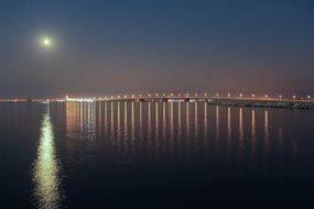 glowing bridge in the moonlight