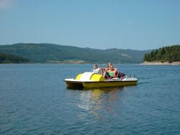 people in the boat in schluchsee