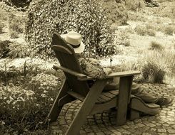 man resting in a chair in the yard