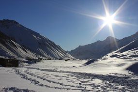 sparkling sun shining in mountains