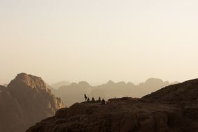 tourists meet the dawn in the mountains