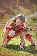 caucasian child girl playing indian