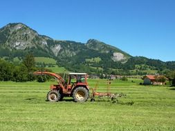 tractor on a green field in germany