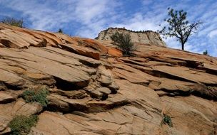Beautiful and colorful rocks at blue sky with white clouds background