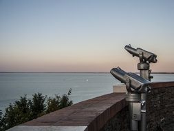 binoculars on the observation deck on the lake