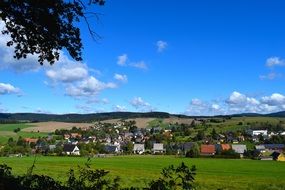 blue sky village summer landscape