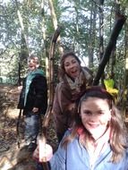 teenagers are photographed in the forest