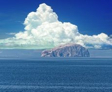 distant view of bass rock island in scotland