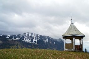pavilion on a green hill