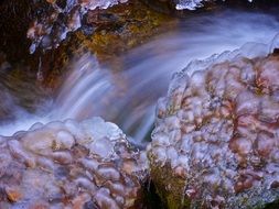 River on the stones in winter