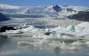 frozen glacial lake with icebergs