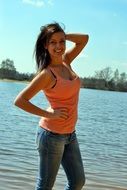 photo of the girl on the lake shore