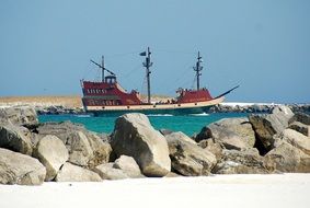 red old boat ocean