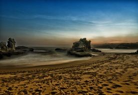 sandy beach at sunset