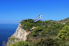 greek flag on the coast