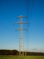 power line on a green field