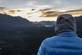 Man in a jacket at the sunset
