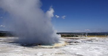 fuming geyser in yellowstone national park, wyoming