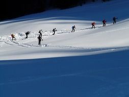 group of people in a ski tour