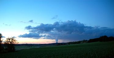 clouds over nuclear power plant at dusk