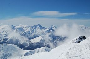 mountains in the snow in a light haze on landscape