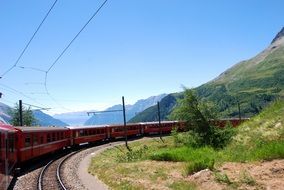 red train in the mountains in Switzerland