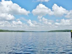 Landscape with the lake under the clouds
