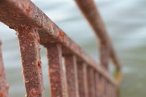 rusty bridge over the river