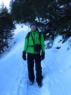 hiking man in green jacket