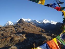 sikkim blue sky with flags mountain scene