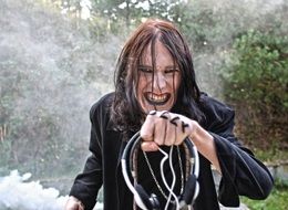 scary man with headphones in his hands